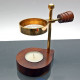 Elegant brass and wooden incense burner